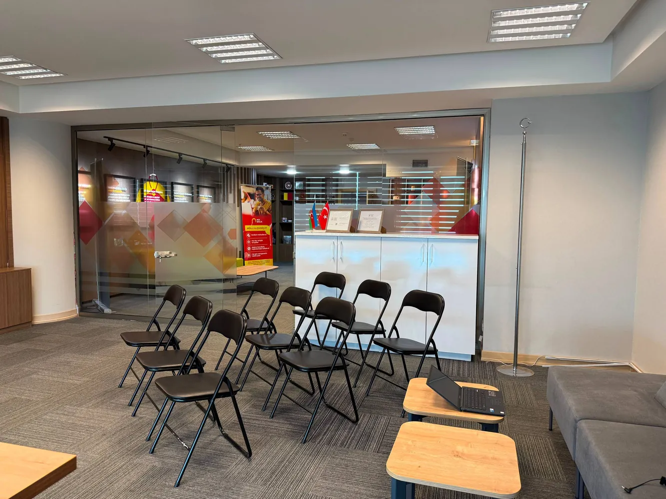 Room at NexBirlik’s Baku office prepared for a community event